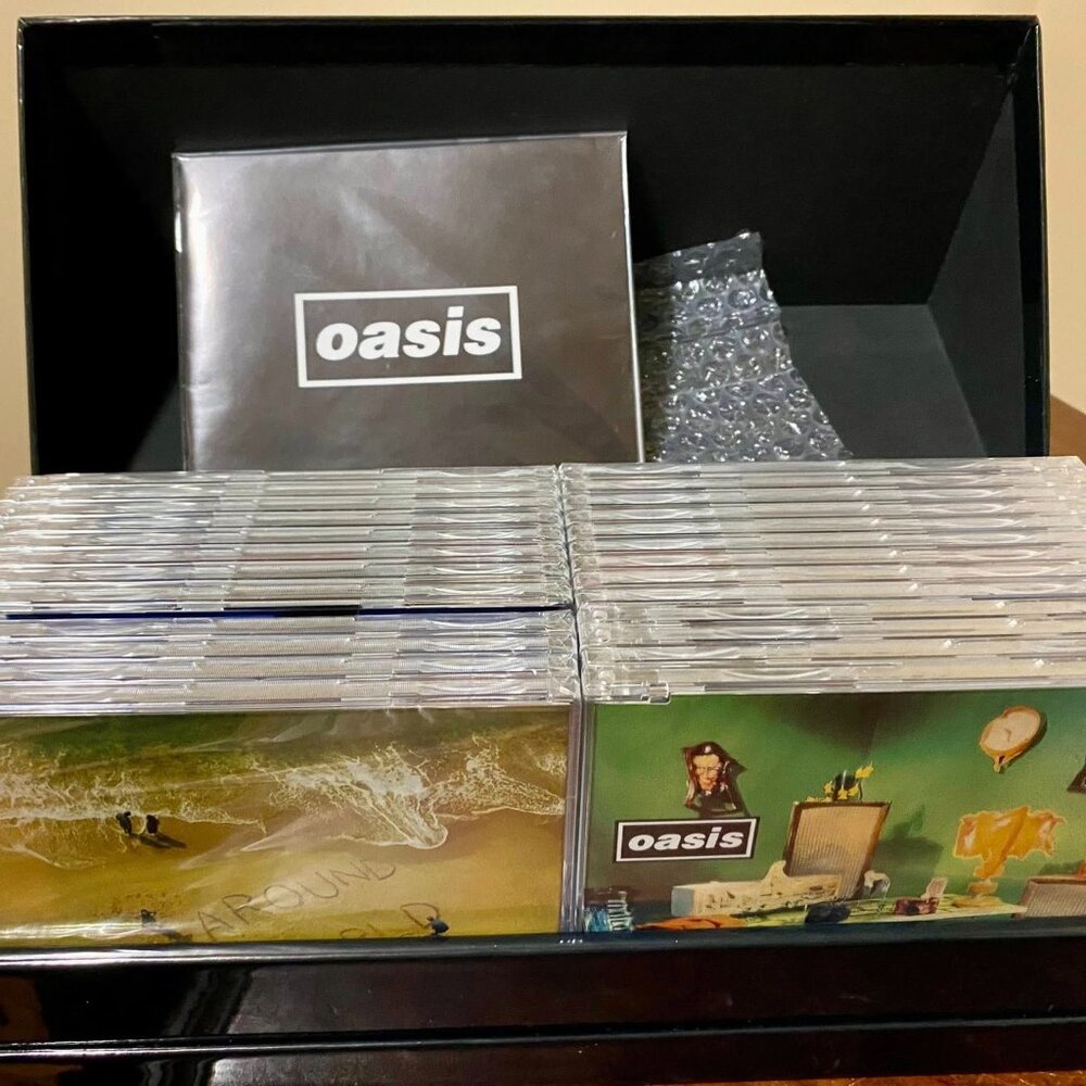 OASIS COMPLETE SINGLES COLLECTION 94-05 - NEW